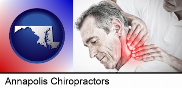 male chiropractor massaging the neck of a patient in Annapolis, MD