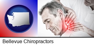 Bellevue, Washington - male chiropractor massaging the neck of a patient