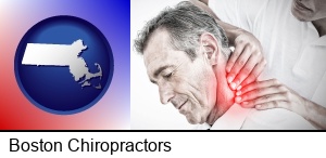 Boston, Massachusetts - male chiropractor massaging the neck of a patient