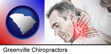 male chiropractor massaging the neck of a patient in Greenville, SC