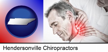 male chiropractor massaging the neck of a patient in Hendersonville, TN
