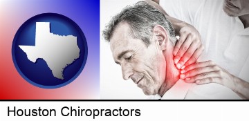 male chiropractor massaging the neck of a patient in Houston, TX