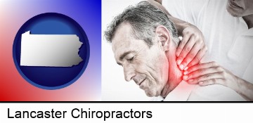male chiropractor massaging the neck of a patient in Lancaster, PA