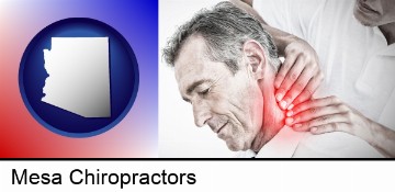 male chiropractor massaging the neck of a patient in Mesa, AZ