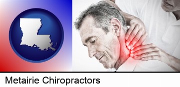 male chiropractor massaging the neck of a patient in Metairie, LA
