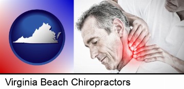 male chiropractor massaging the neck of a patient in Virginia Beach, VA