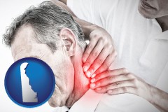 delaware map icon and male chiropractor massaging the neck of a patient