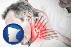 minnesota map icon and male chiropractor massaging the neck of a patient