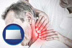 north-dakota map icon and male chiropractor massaging the neck of a patient