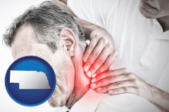 nebraska map icon and male chiropractor massaging the neck of a patient