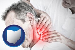 ohio map icon and male chiropractor massaging the neck of a patient