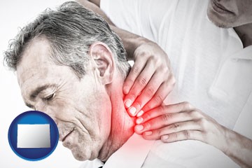 male chiropractor massaging the neck of a patient - with Colorado icon