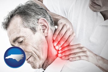 male chiropractor massaging the neck of a patient - with North Carolina icon