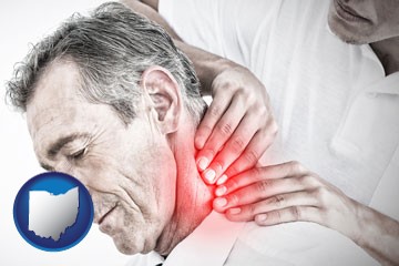male chiropractor massaging the neck of a patient - with Ohio icon