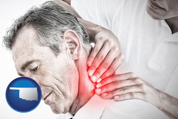 male chiropractor massaging the neck of a patient - with Oklahoma icon