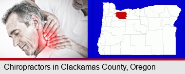 male chiropractor massaging the neck of a patient; Clackamas County highlighted in red on a map