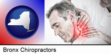 male chiropractor massaging the neck of a patient in Bronx, NY