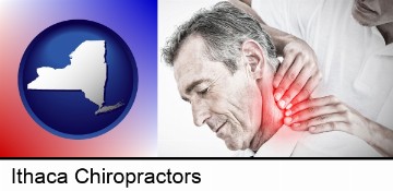 male chiropractor massaging the neck of a patient in Ithaca, NY