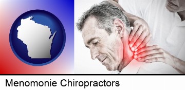 male chiropractor massaging the neck of a patient in Menomonie, WI