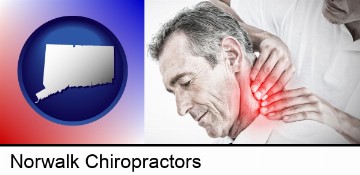 male chiropractor massaging the neck of a patient in Norwalk, CT