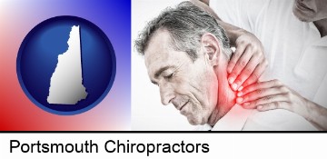 male chiropractor massaging the neck of a patient in Portsmouth, NH