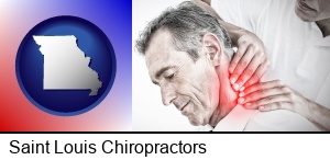 Saint Louis, Missouri - male chiropractor massaging the neck of a patient