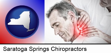 male chiropractor massaging the neck of a patient in Saratoga Springs, NY