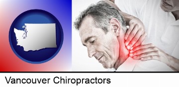 male chiropractor massaging the neck of a patient in Vancouver, WA