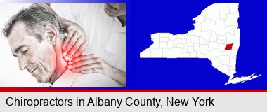 male chiropractor massaging the neck of a patient; Albany County highlighted in red on a map