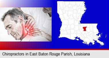 male chiropractor massaging the neck of a patient; East Baton Rouge Parish highlighted in red on a map