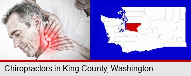 male chiropractor massaging the neck of a patient; King County highlighted in red on a map