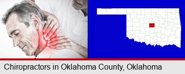 male chiropractor massaging the neck of a patient; Oklahoma County highlighted in red on a map