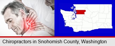 male chiropractor massaging the neck of a patient; Snohomish County highlighted in red on a map